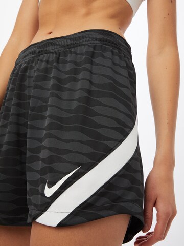 Regular Pantalon de sport NIKE en noir