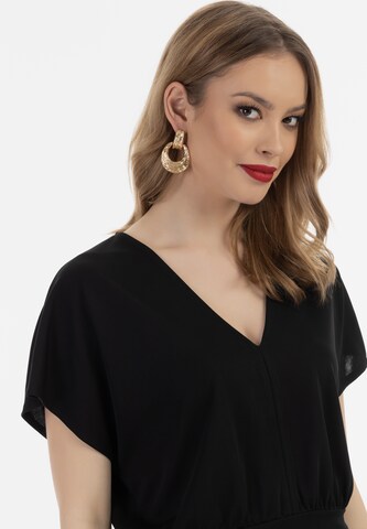 faina - Camiseta en negro: frente