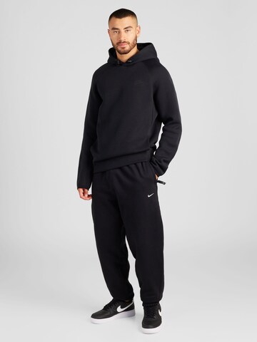 Nike Sportswear Zúžený strih Nohavice - Čierna