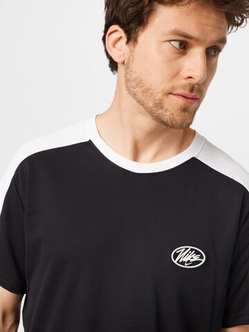 NIKE - Camiseta funcional en negro