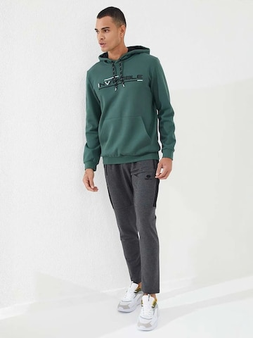 Sweat-shirt Tommy Life en vert
