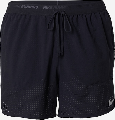 Sportinės kelnės 'STRIDE' iš NIKE, spalva – juoda, Prekių apžvalga