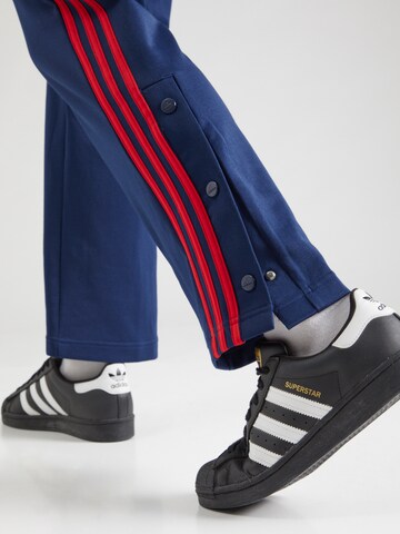 ADIDAS SPORTSWEAR Boot cut Workout Pants 'Iconic' in Blue