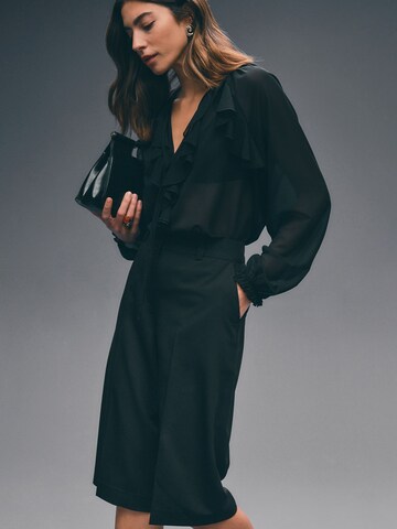 Next - Blusa en negro