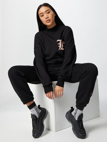 ABOUT YOU x Mero Sweatshirt 'OV Crewneck K' in Black