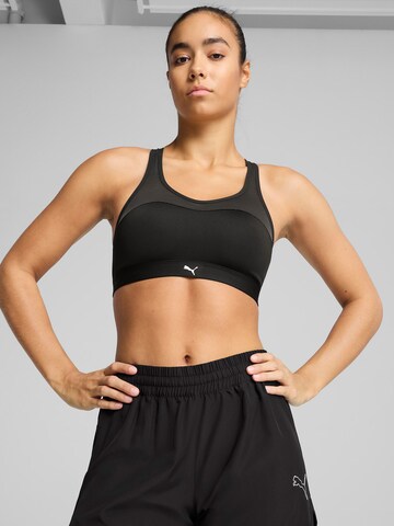 Bustino Reggiseno sportivo 'Move Strong' di PUMA in nero: frontale