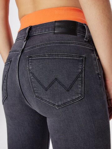 WRANGLER Skinny Kavbojke | siva barva