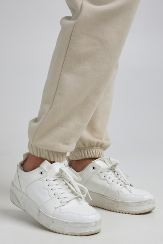 The Jogg Concept Tapered Pants in Beige