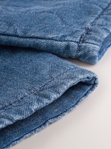 Next Tussenjas in Blauw