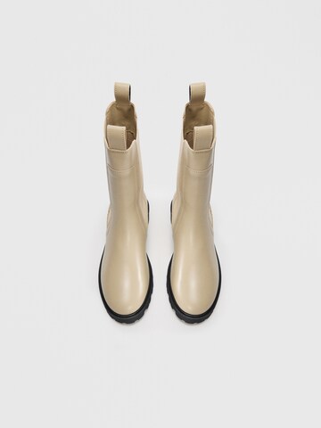 TOMMY HILFIGER - Botas Chelsea en beige: arriba