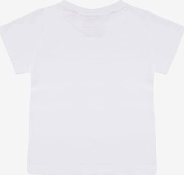 T-Shirt 'mini-laugh.' smiler. en blanc