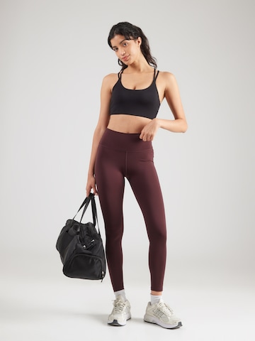 Skinny Pantaloni sportivi 'Pulse' di Hummel in marrone
