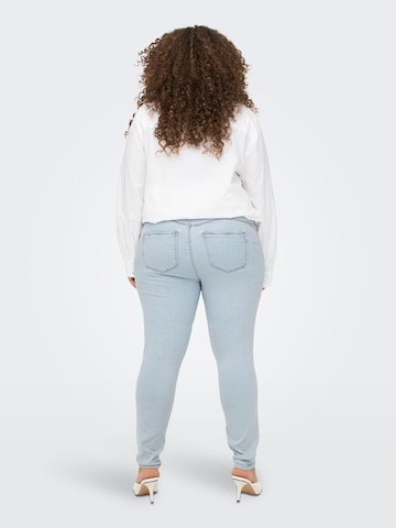 Skinny Jeans 'CARPaisy' di ONLY Carmakoma in blu