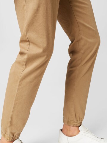 TOM TAILOR DENIM Tapered Byxa i beige