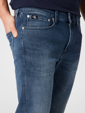 Calvin Klein Jeans Tapered Jeans in Blau