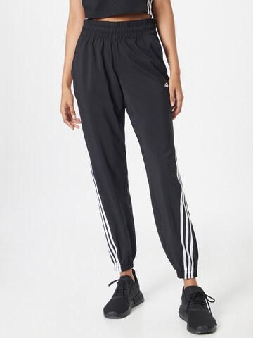 ADIDAS SPORTSWEAR Tapered Workout Pants in Black: front