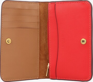 Porte-monnaies COACH en rouge