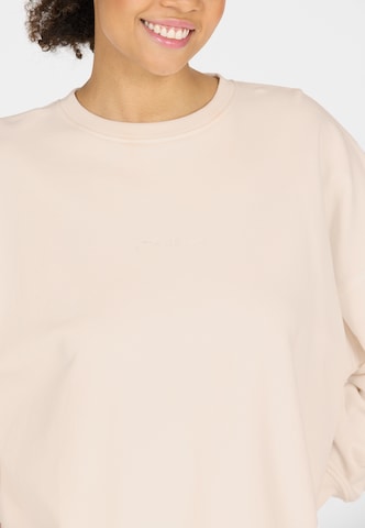 Athlecia Sports sweatshirt in Beige