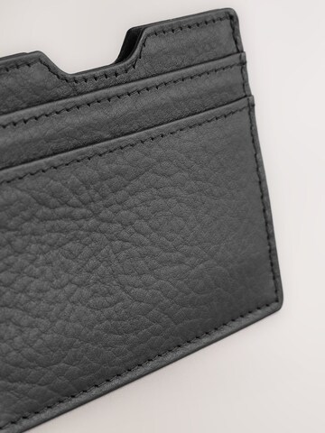 Next Puzdro - Čierna