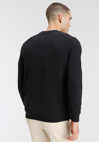 PUMA Sports sweatshirt in Black