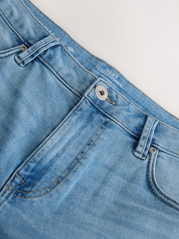 Next Liibuv Teksapüksid 'Motionflex', värv sinine