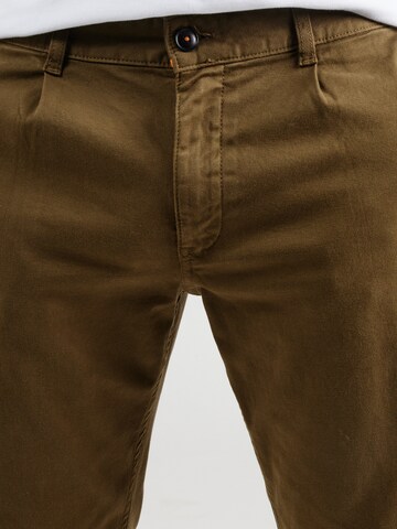 regular Pantaloni chino di BOSS in verde