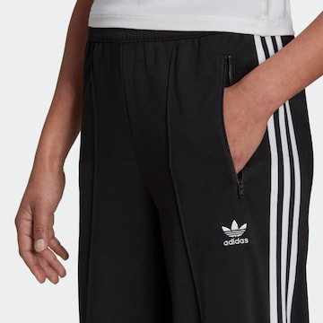 ADIDAS ORIGINALS Wide Leg Hose in Schwarz