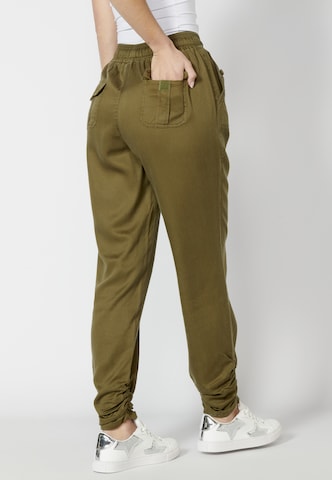 KOROSHI Tapered Jeans in Green