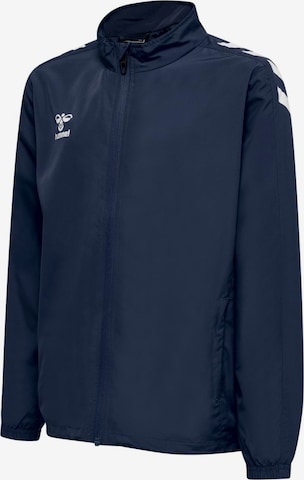 Veste de sport 'hmlCORE XK MICRO ZIP JACKET KIDS' Hummel en bleu : devant