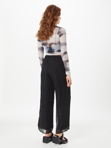 Wide leg Pantaloni di River Island in nero