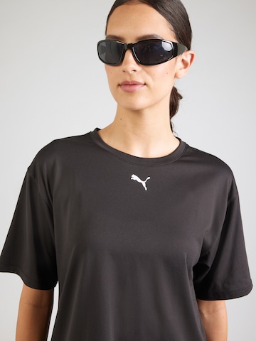 PUMA Funktionstopp 'TAD ESSENTIAL' i svart