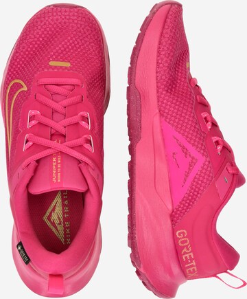 Chaussure de course 'Juniper Trail 2' NIKE en rose