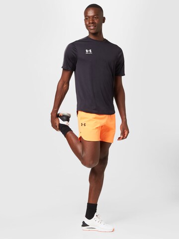 UNDER ARMOUR Regular Workout Pants 'Peak' in Orange