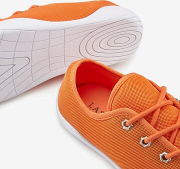 LASCANA Sneakers in Orange