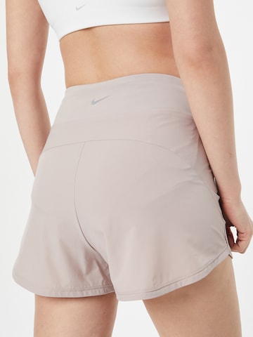 NIKE Regular Workout Pants 'BLISS' in Grey