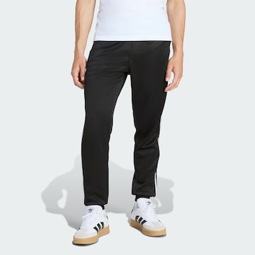 ADIDAS ORIGINALS Tapered Byxa 'SST' i svart: framsida