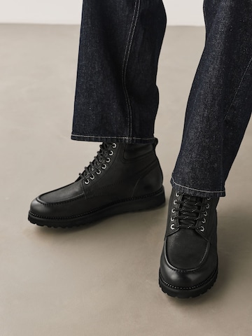 Boots stringati di Next in nero