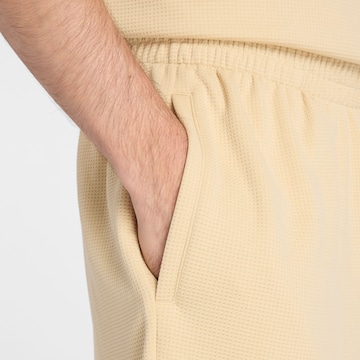 Loosefit Pantaloni 'Textured Check Short' di new balance in giallo