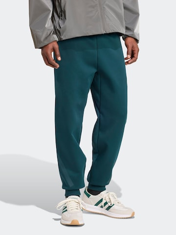 ADIDAS SPORTSWEAR Tapered Παντελόνι φόρμας 'Z.N.E.' σε πράσινο: μπροστά