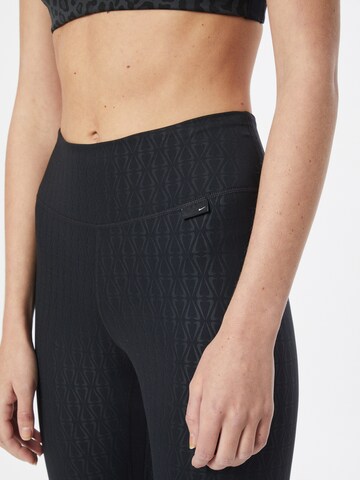 NIKE - Skinny Pantalón deportivo 'ONE LUXE' en negro
