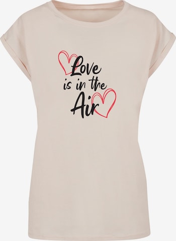 Merchcode T-Shirt 'Valentines Day - Love is in the Air' in Beige: predná strana