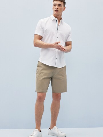 regular Pantaloni chino di Next in beige