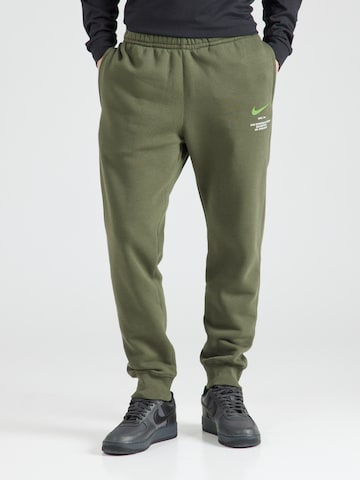 Nike Sportswear Дънки Tapered Leg Панталон в зелено: отпред