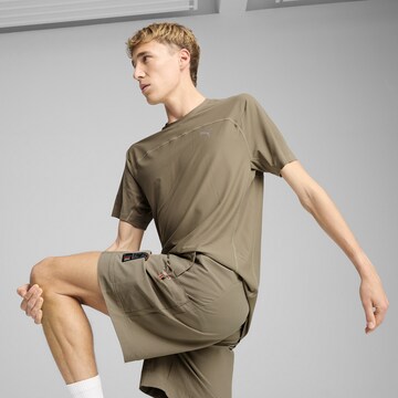 PUMA Performance shirt 'Seasons' in Brown
