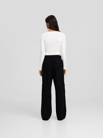 Loosefit Pantaloni cu buzunare de la Bershka pe negru