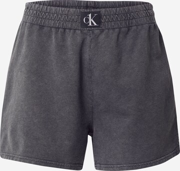 Calvin Klein Swimwear Kalhoty – černá: přední strana