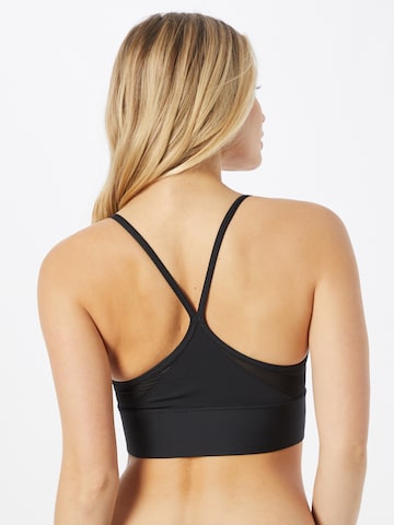 Bustino Reggiseno sportivo 'Indy' di NIKE in nero