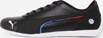 PUMA Athletic Shoes in Black: front