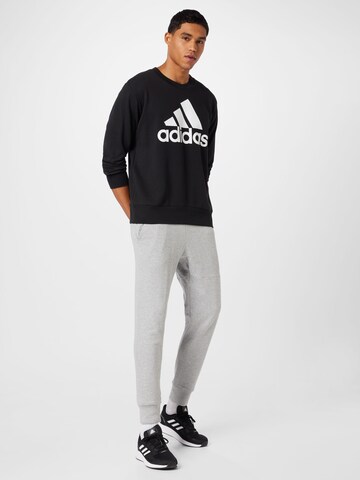 ADIDAS SPORTSWEAR Sportsweatshirt 'Essentials' i svart