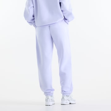 new balance - Tapered Calças 'Sport Essentials Fleece Jogger' em roxo